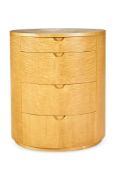 λ NICK ALLEN (BRITISH, B.1952), AN OVAL CHEST OF DRAWERS