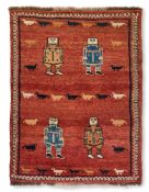 AN IRANIAN HANDWOVEN RUG