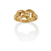 CARTIER, AN 18CT GOLD 'AGRAFE' RING