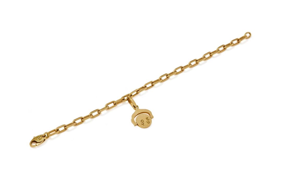 CARTIER, A 'SANTOS' BRACELET WITH 'I LOVE YOU' CHARM - Image 1 of 3