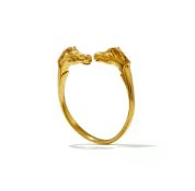 HERMÈS, TETE DE CHEVAL, A POLISHED DOUBLE HORSES HEAD BANGLE BAND