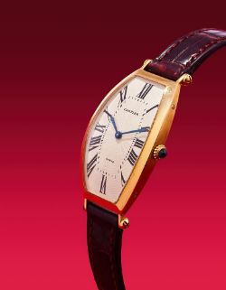 Y CARTIER, TONNEAU, A GOLD WRISTWATCH
