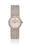 LONGINES, A LADY'S WHITE GOLD AND DIAMOND BRACELET WATCH