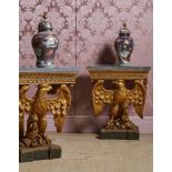 A PAIR OF CARVED GILTWOOD AND MARBLE TOPPED EAGLE CONSOLE TABLES, IN THE MANNER OF WILLIAM KENT