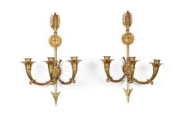 A PAIR OF FRENCH GILT METAL THREE BRANCH WALL LIGHTS, LATE 19TH OR EARLY 20TH CENTURY