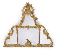A CARVED GILTWOOD MIRROR, IN GEORGE III STYLE, IN THE MANNER OF THOMAS JOHNSON, 19TH CENTURY