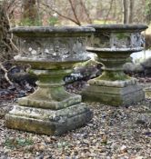 A PAIR OF COMPOSITION STONE GOTHIC PLANTERS, LATE 20TH CENTURY