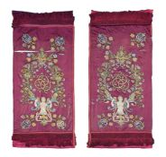 A PAIR OF EMBROIDERED PLUM RED SILK HANGING PANELS, PROBABLY ITALIAN, 19TH CENTURY
