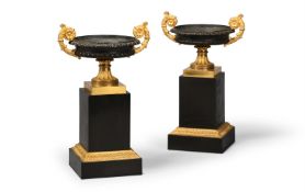 A PAIR OF FRENCH RESTAURATION BRONZE AND ORMOLU MOUNTED TAZZA, EARLY 19TH CENTURY