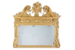 A LATE GEORGE II CARVED GILTWOOD OVERMANTEL MIRROR, CIRCA 1750