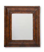 A WILLIAM & MARY OLIVEWOOD OYSTER VENEERED CUSHION FRAMED MIRROR, CIRCA 1690