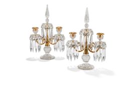 A PAIR OF GILT BRONZE AND CUT GLASS TWO LIGHT CANDELABRA, EARLY 19TH CENTURY