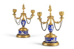 A PAIR OF ENAMEL MOUNTED GILT METAL CANDLESTICKS, FRENCH, LATE 19TH CENTURY