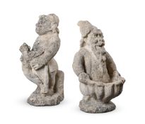 TWO CARVED LIMESTONE GNOMES, 19TH CENTURY