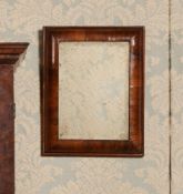 A WILLIAM & MARY WALNUT CUSHION MIRROR, LATE 17TH CENTURY