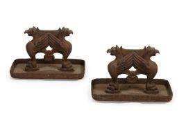 A PAIR OF LATE REGENCY CAST IRON BOOT SCRAPERS, CIRCA 1820-1840