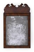 A QUEEN ANNE WALNUT CUSHION MIRROR, CIRCA 1710