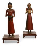 A LARGE PAIR OF POLYCHROME DECORATED CARVED WOOD FIGURES OF A MAN AND A WOMAN, INDIAN, 20TH CENTURY