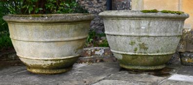 A LARGE PAIR OF COMPOSITION STONE PLANTERS, 20TH CENTURY
