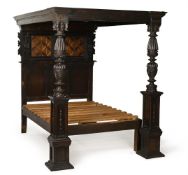 A CARVED OAK TESTER BED, INCORPORATING 16TH CENTURY, 17TH CENTURY AND LATER ELEMENTS