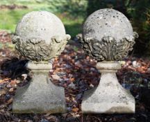 A PAIR OF COMPOSITION STONE GATEPOST BALL FINIALS, CONTEMPORARY