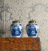 A PAIR OF DUTCH DELFT BLUE AND WHITE TOBACCO JARS AND BRASS COVERS, DE DRIE KLOKKEN, CIRCA 1800