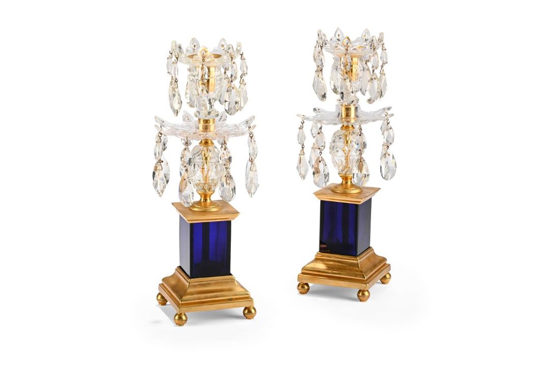 A PAIR OF GEORGE III GILT BRONZE, CUT CLEAR AND BLUE GLASS CANDLESTICKS, CIRCA 1800 - Image 1 of 3