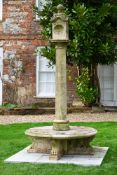 A LARGE CARVED LIMESTONE MULTIDIAL SUNDIAL COLUMN, 20TH CENTURY