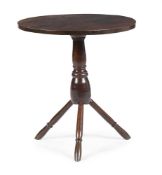 A GEORGE III OAK 'CAT' OR CRICKET TABLE, CIRCA 1800