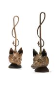 A PAIR OF BRASS FOX HEAD DOOR PORTERS OR DOOR STOPS, EARLY 20TH CENTURY