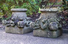 A LARGE PAIR OF COMPOSITION STONE CORINTHIAN CAPITALS, LATE 20TH CENTURY