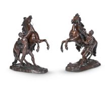 AFTER GUILLAUME COUSTOU, A LARGE PAIR OF BRONZE MARLY HORSES, 19TH CENTURY