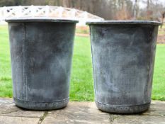 A PAIR OF PATINATED COPPER AND RIVETED CIRCULAR PLANTERS