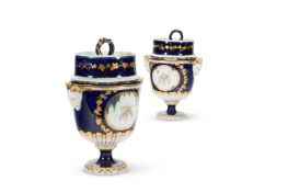 A PAIR OF CHELSEA-DERBY TWO-HANDLED URN-SHAPED PEDESTAL ICE PAILS, COVERS AND LINERS, CIRCA 1775