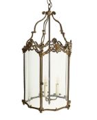 A FRENCH GILT BRONZE HALL LANTERN, IN RÉGENCE STYLE, 19TH CENTURY