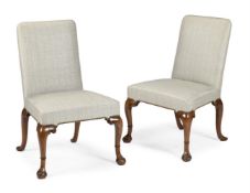 A PAIR OF GEORGE II WALNUT ARMCHAIRS, CIRCA 1740