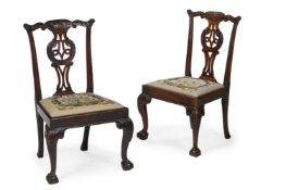 A PAIR OF GEORGE III CARVED MAHOGANY CHAIRS, CIRCA 1760