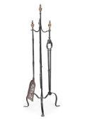 A GEORGE III SET OF THREE WROUGHT IRON FIRE TOOLS ON STAND, LATE 18TH CENTURY
