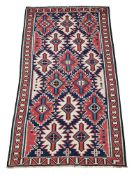 A KUBA KILIM CARPET, CIRCA 1880