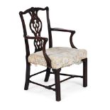 A CARVED MAHOGANY ARMCHAIR, IN GEORGE III STYLE, IN THE MANNER OF THOMAS CHIPPENDALE, 19TH CENTURY