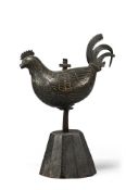 A RARE CHARLES I MONARCHIST BRONZE WEATHERCOCK, BY F. BASSAND, 1646