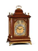 A LATE VICTORIAN GILT BRASS MOUNTED MAHOGANY QUARTER-CHIMING BRACKET CLOCK OF SMALLER PROPORTIONS