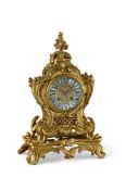 A FRENCH LOUIS XV STYLE ORMOLU MANTEL CLOCK IN THER MANNER OF JOSEPH DE SAINT GERMAIN