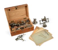 A GERMAN STEEL AND BRASS WATCHMAKER'S 6MM LATHE OUTFIT