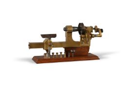 A SWISS BRASS AND STEEL WATCHMAKER’S 6MM MANDREL-FRAME LATHE