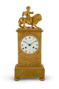 A FRENCH EMPIRE ORMOLU MANTEL CLOCK