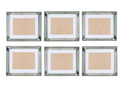 A GROUP OF SIX LARGE RECTANGULAR EBONISED AND BEVELL MIRRORED PICTURE FRAMES, OF RECENT MANUFACTURE