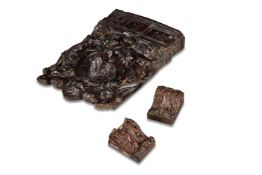 A CARVED OAK PANEL, EARLY 17TH CENTURY, TOGETHER WITH A PAIR OF CARVED OAK SMALL CORBELS