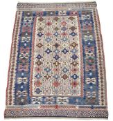 AN IVORY GROUND KILIM RUG, 20TH CENTURY