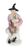 A BOW PORCELAIN MODEL OF A HARLEQUIN FROM THE COMMEDIA DELL'ARTE, CIRCA 1755